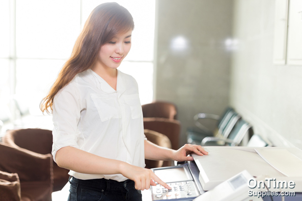 asian beautiful woman using printer in office